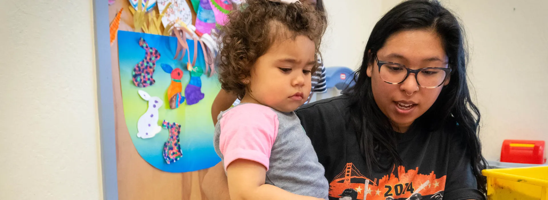 Maria reading book in kids club