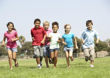 Kids running on grass