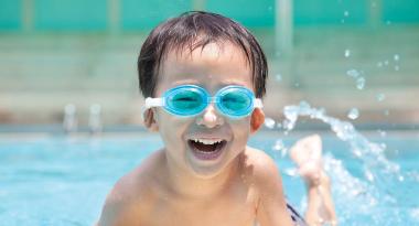 Youth enjoys swimming outdoors