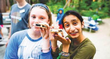 Teens making S'Mores