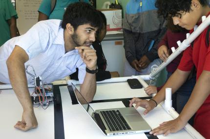 Mentor works with youth.