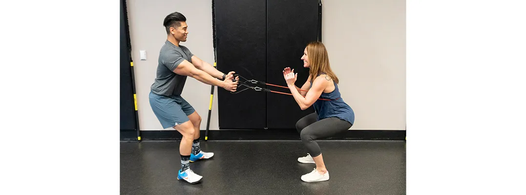 Static squat with cable row