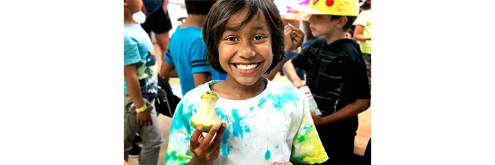 Kid enjoying a healthy snack