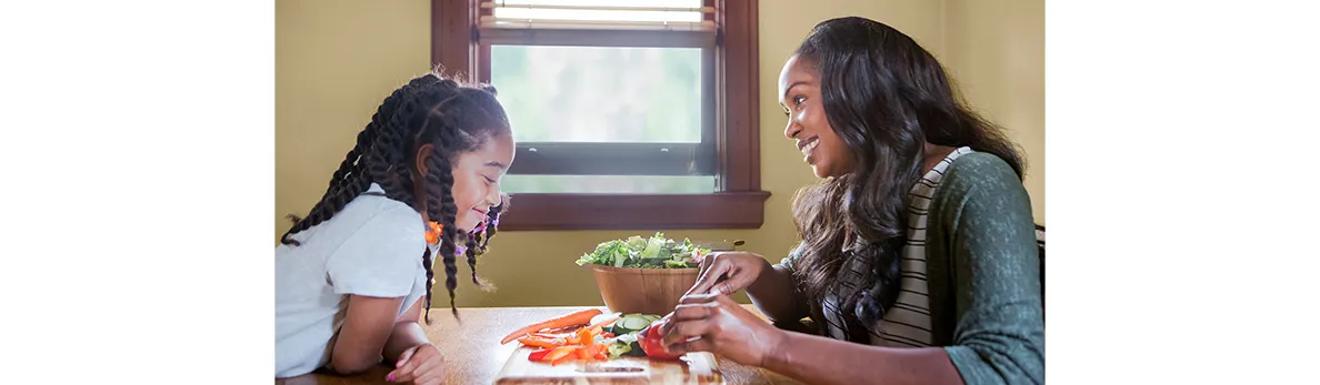 Mom and daughter making a healthy meal