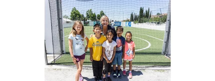 President and CEO, Sandy Berlin Walker with kids