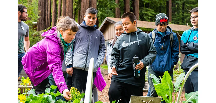 Sasha with kids in the garden