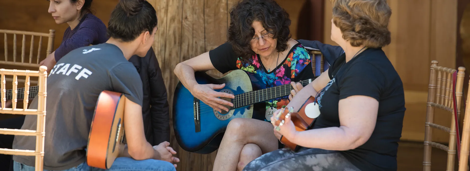 Family camp guitar playing